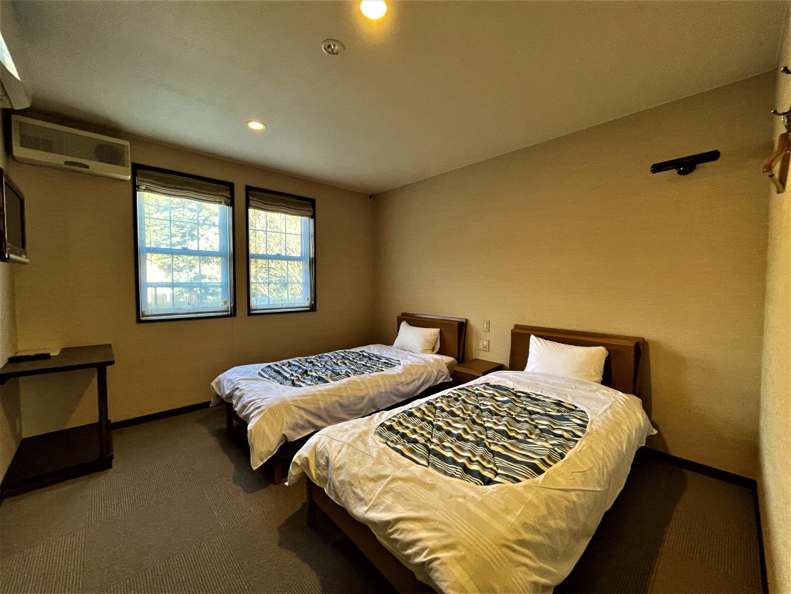 グループサンタフェ｜静岡県・伊豆高原｜寝室（シングル×2）